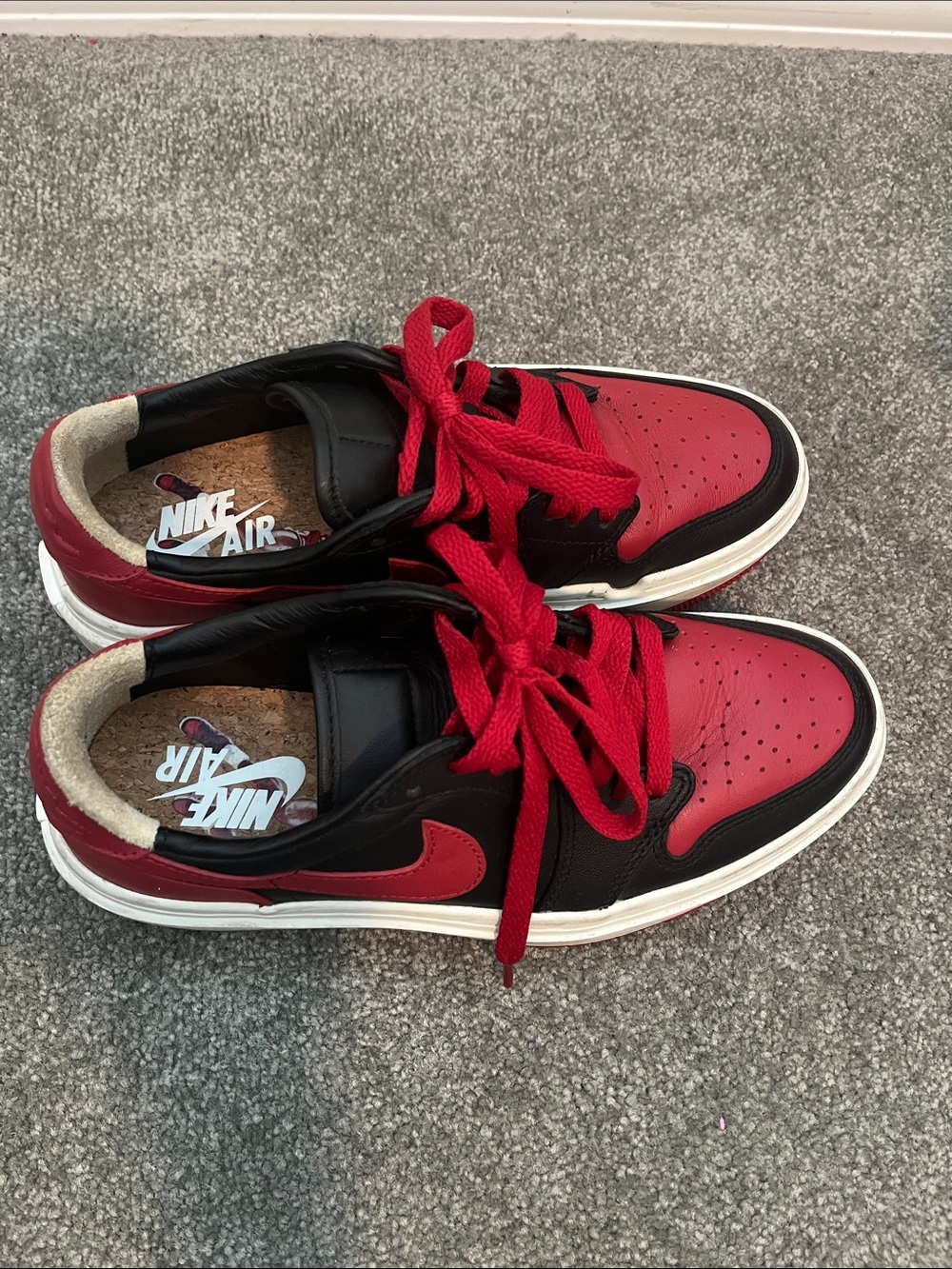 Nike Women's Air Jordan 1 Low-Top Sneaker in Red, Black and White